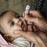 Polio vaccination to a child Photo By UNICEF