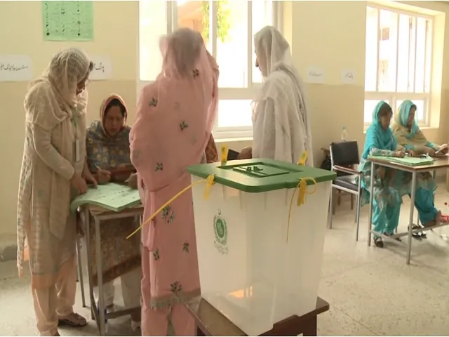 Women poling votes in election Photo File 640x480